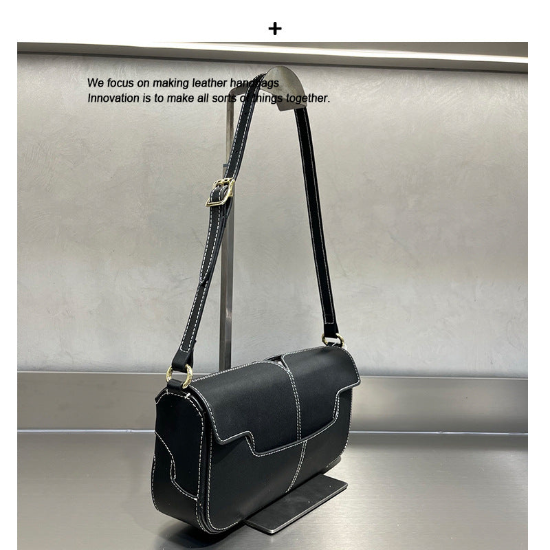 今年流行包包女2025新款质感小众编织手提腋下包洋气迷你口红包