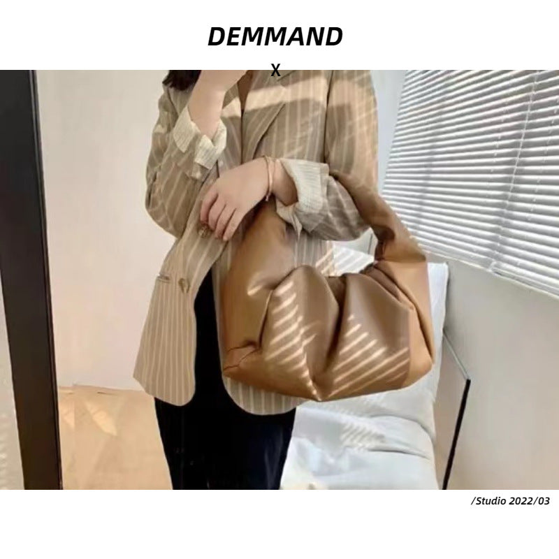 包包女2022新款女包牛角包pouch云朵包饺子包手提单肩包真皮女包