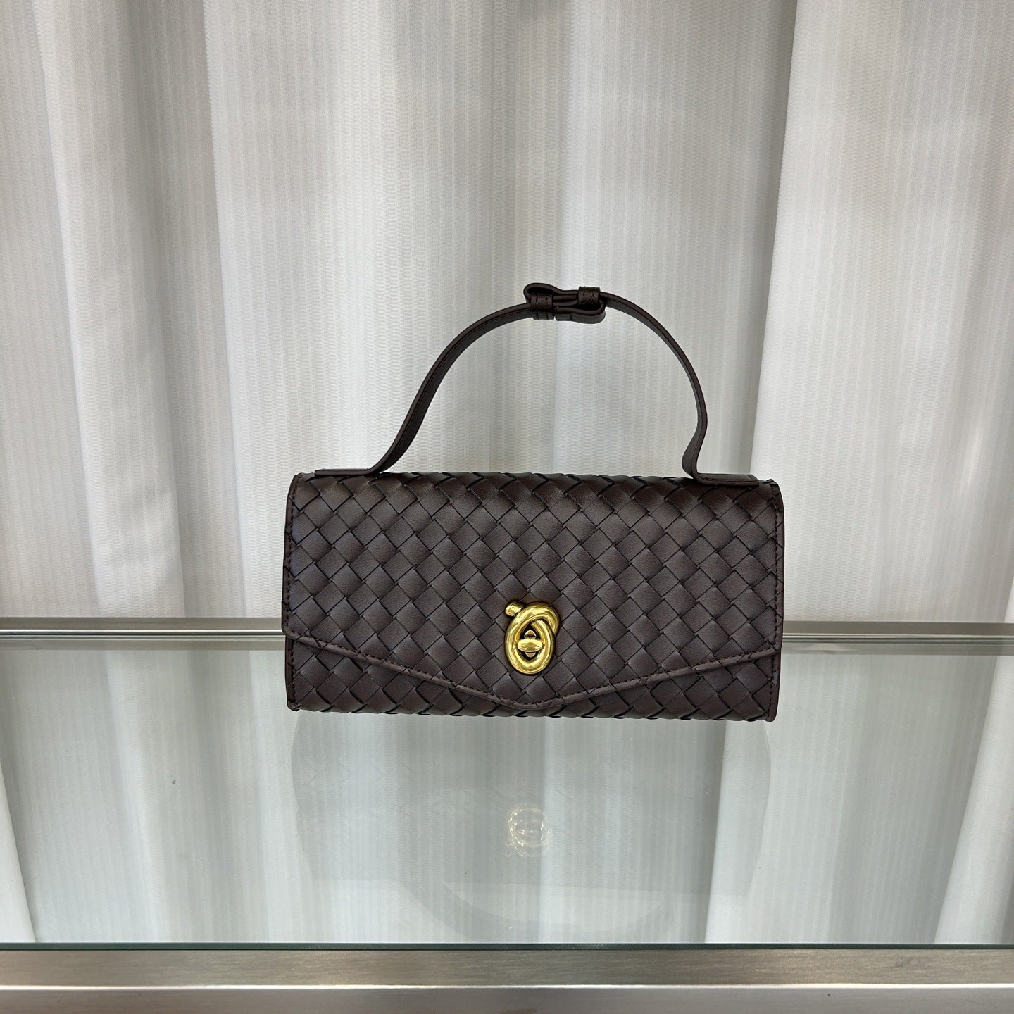 2025春夏新款knotlock牛皮信封包跨境时尚编织包单肩腋下手提包女