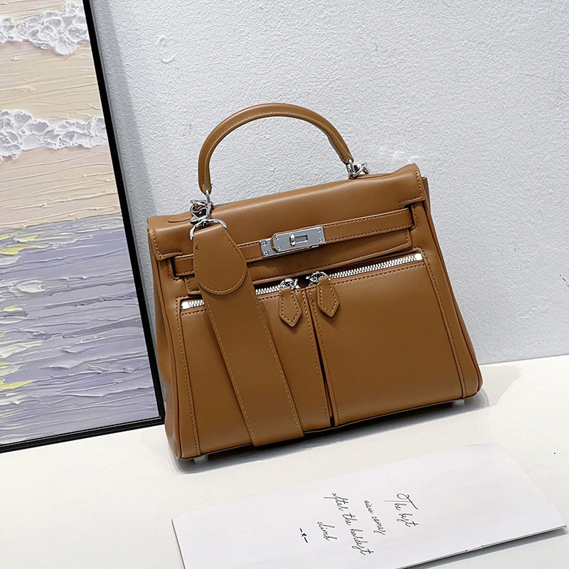 百搭通勤单肩斜挎包宽肩带凯莉包手提包真皮大容量单肩斜挎包女