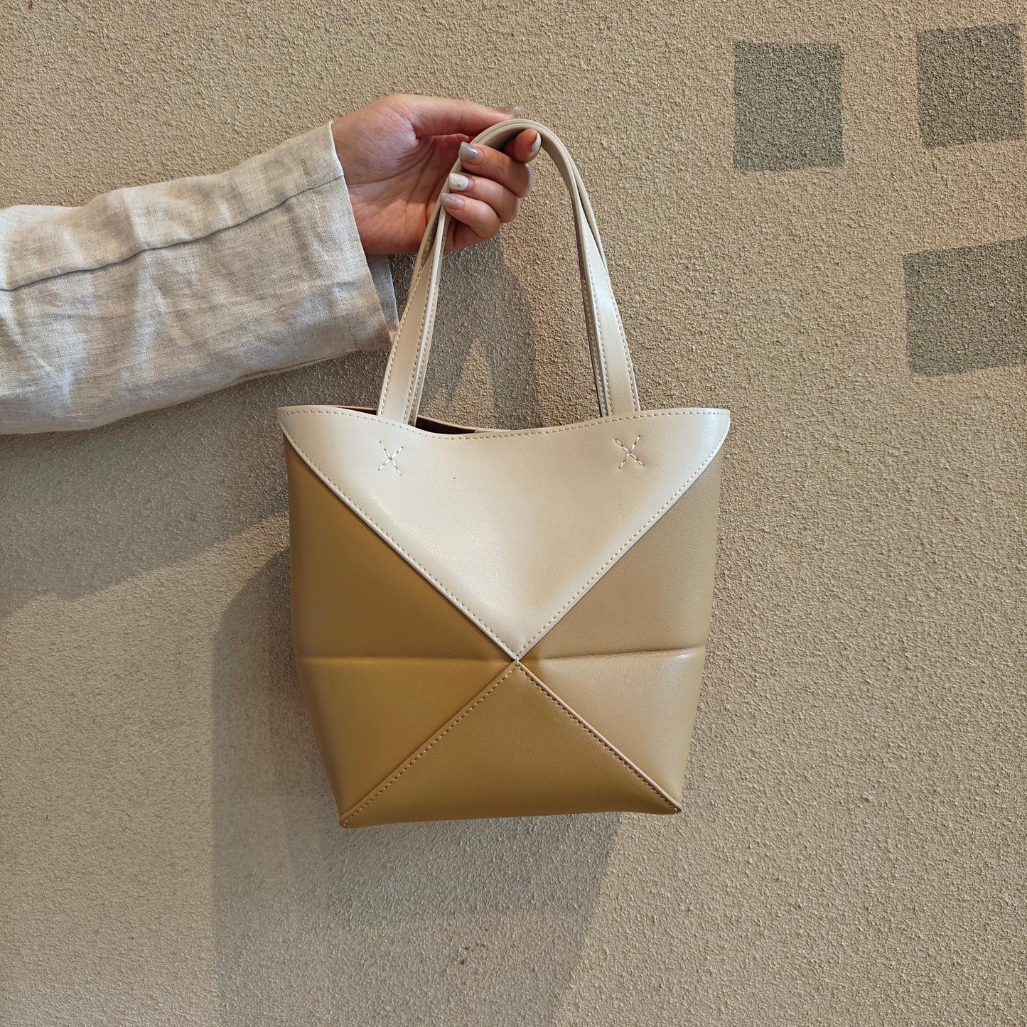 2024新款真皮女包变形几何拼接折叠托特单肩斜跨潮流双肩厂家