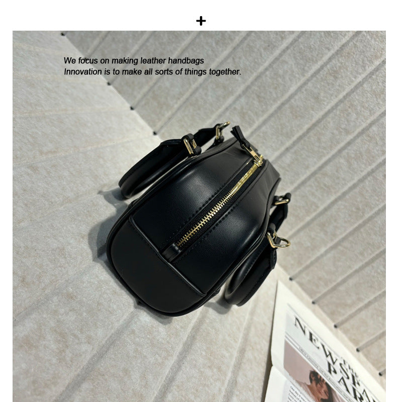 婉云质感真皮2025新款单肩斜挎包迷你复古手提保龄球包小众设计