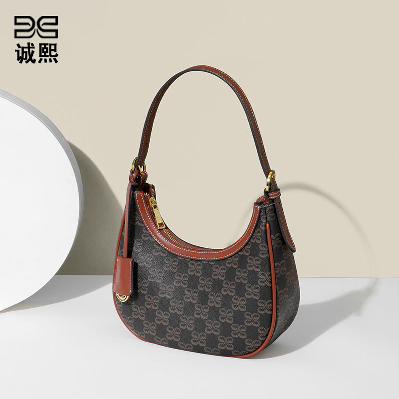 港风潮流老花月牙包百搭新月包小众设计手提包通勤单肩斜挎腋下包