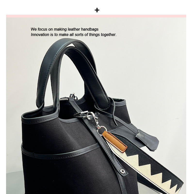 小众设计蜡线菜篮子帆布拼接平纹真牛皮口袋包手提手拎女包水桶包