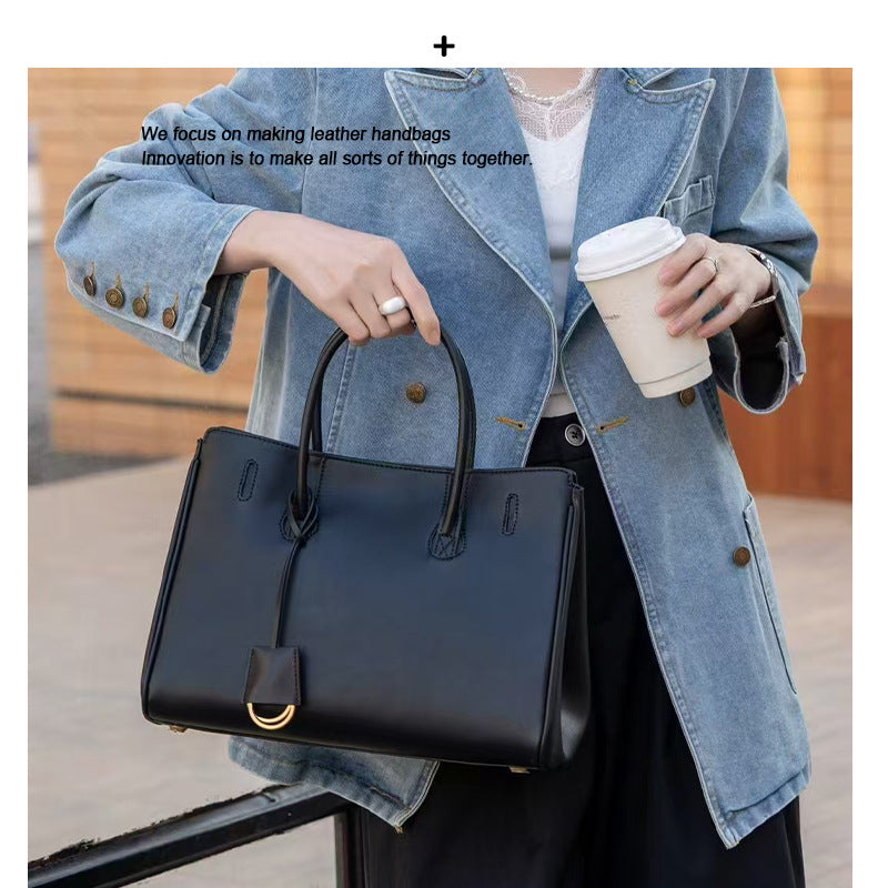 头层牛皮可多用黑色机车手提秋冬手提单肩腋下超大容量托特锁扣女