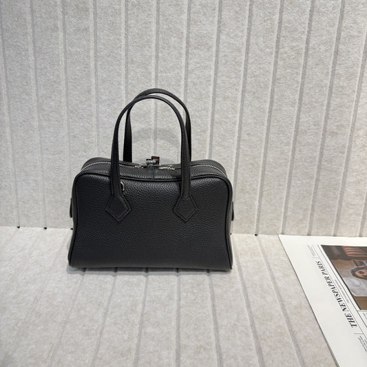 2025新款高端TC皮牛皮维多利亚真皮女包简约保龄球腋下包手提斜挎