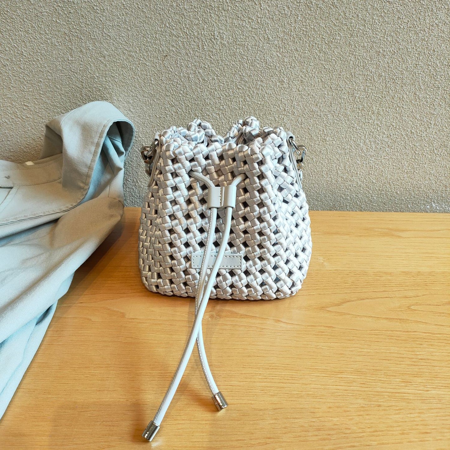 水桶包小包2024夏新法式小众高级感手工编织手提单肩斜挎包真皮女