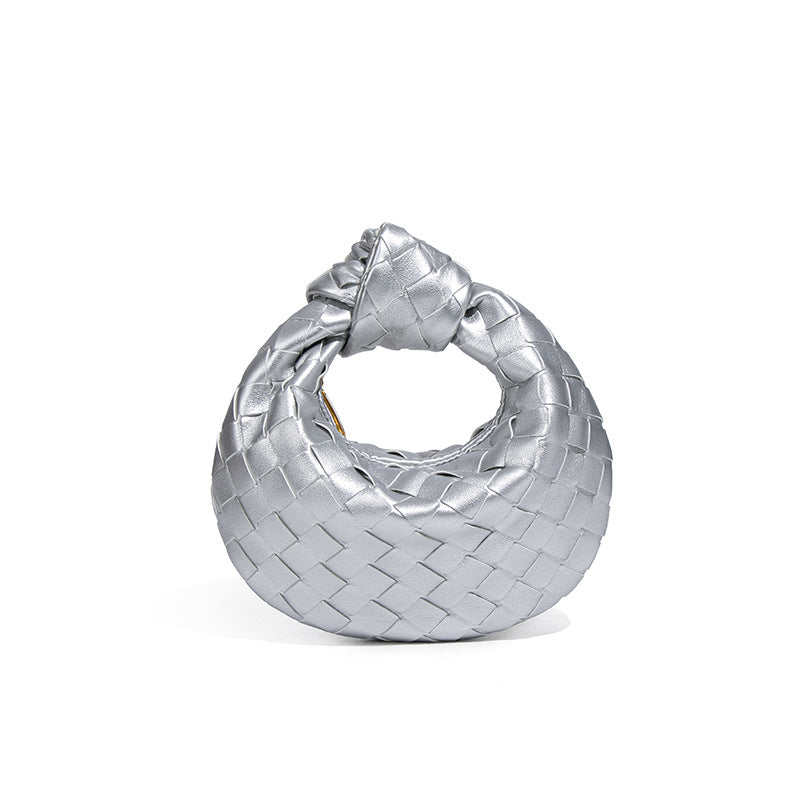 外贸新品时尚手拎饺子包打结手工编织女包百搭mini质感纯色牛角包