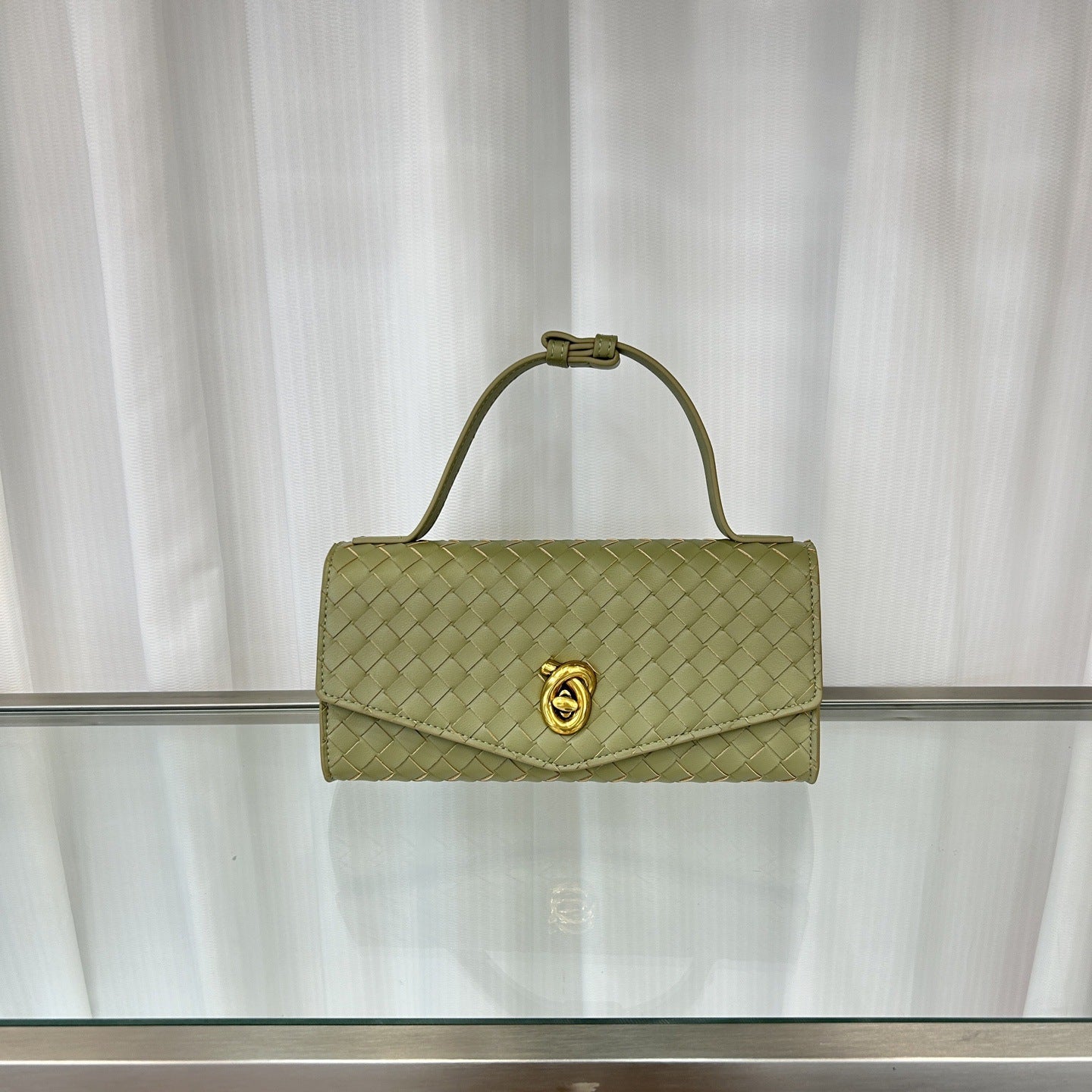 2025春夏新款knotlock牛皮信封包跨境时尚编织包单肩腋下手提包女