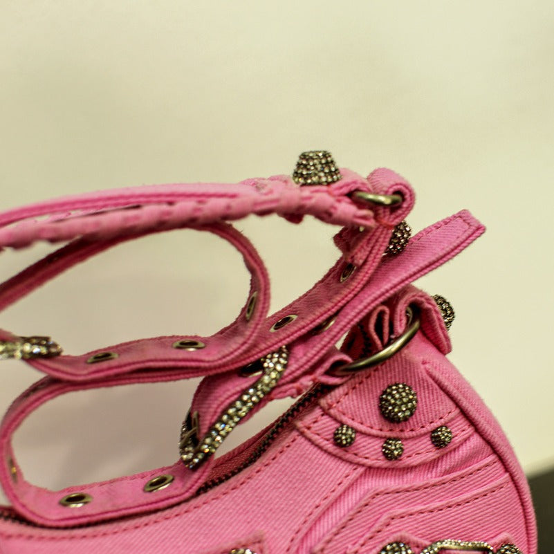 真皮包包女2022新款单肩轻奢月牙包质感法式腋下铆钉流苏褶斜挎