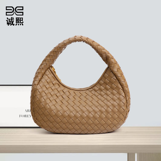 休闲百搭清新手拎月牙包包女网红同款小众简约轻便编织饺子手提包