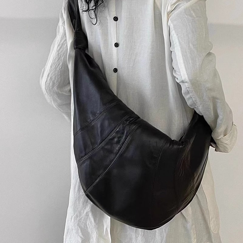 大容量慵懒女包法国小众牛角包羊皮可颂包真皮饺子包斜挎腰包大