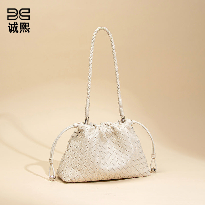 高级感简约单肩腋下女包小众设计垃圾袋斜跨编织包百搭饺子云朵包