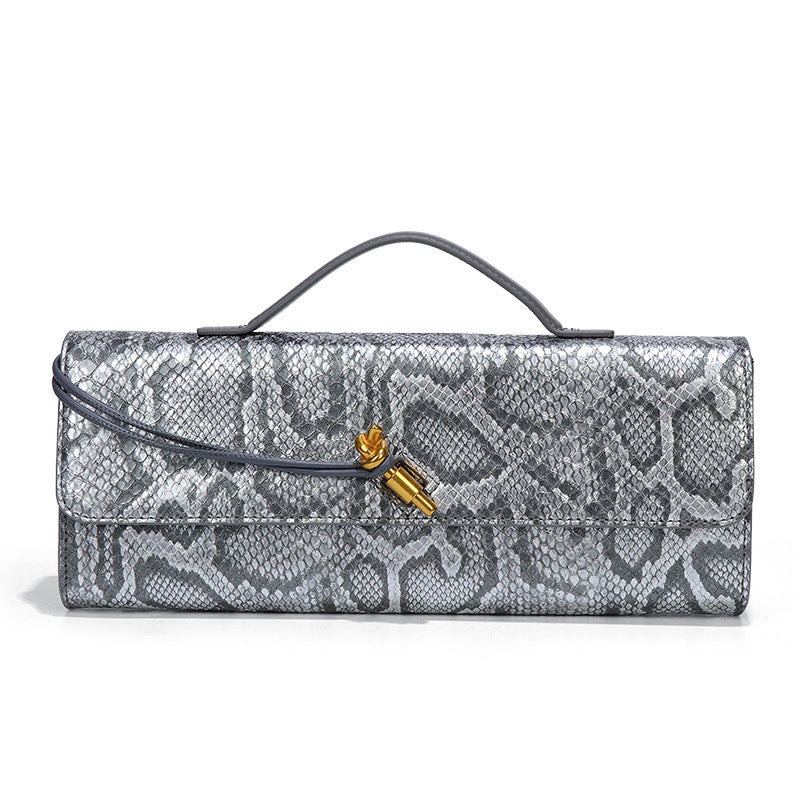 高级感手拿晚宴包包女款横版潮流石头纹法棍包复古小众单肩斜挎包