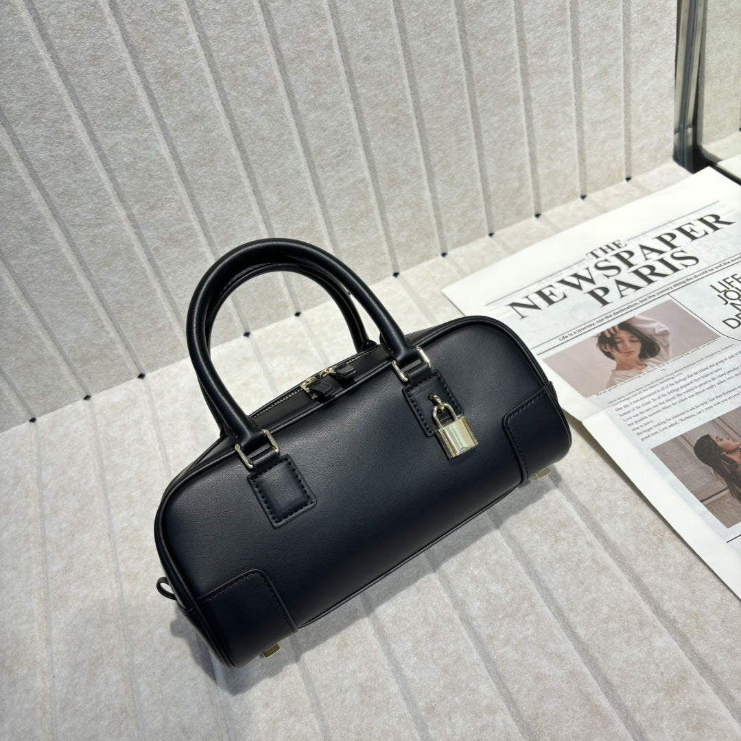 婉云质感真皮2025新款单肩斜挎包迷你复古手提保龄球包小众设计