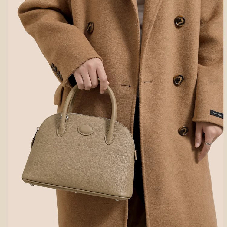 新款荔枝纹真皮贝壳包头层牛皮保龄球手提包拉链大容量通勤女包