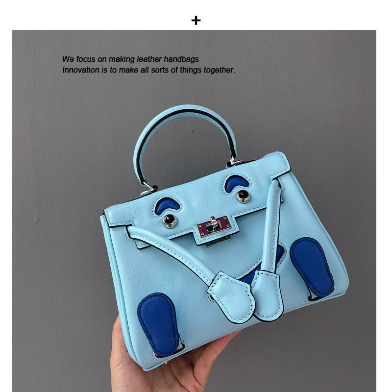 2025春季高级感头层牛皮笑脸包 千禧娃娃迷你凯莉包可爱斜挎包