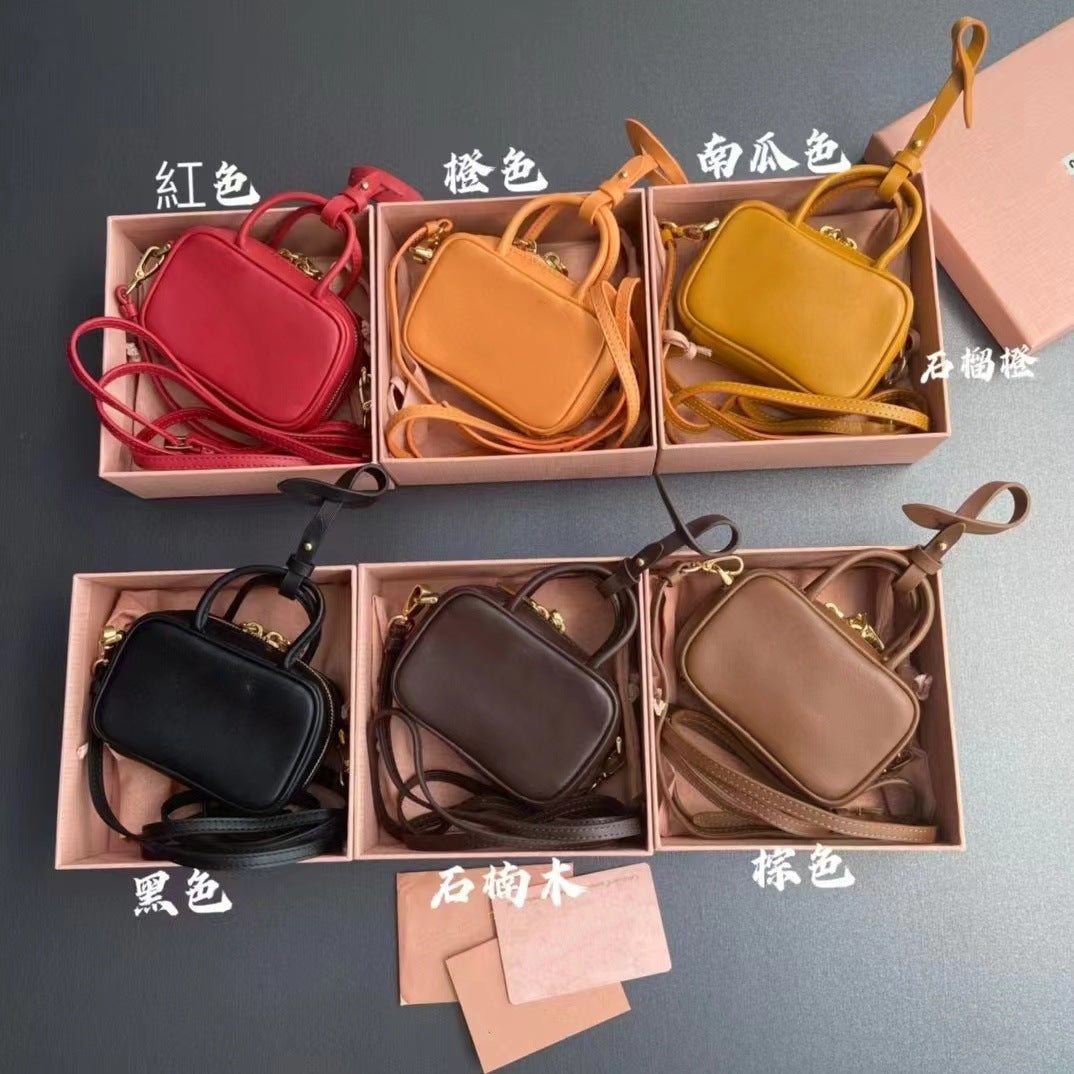 秋冬麂皮磨砂牛皮mini保龄球手提包真皮小方包手机包单肩斜挎包女