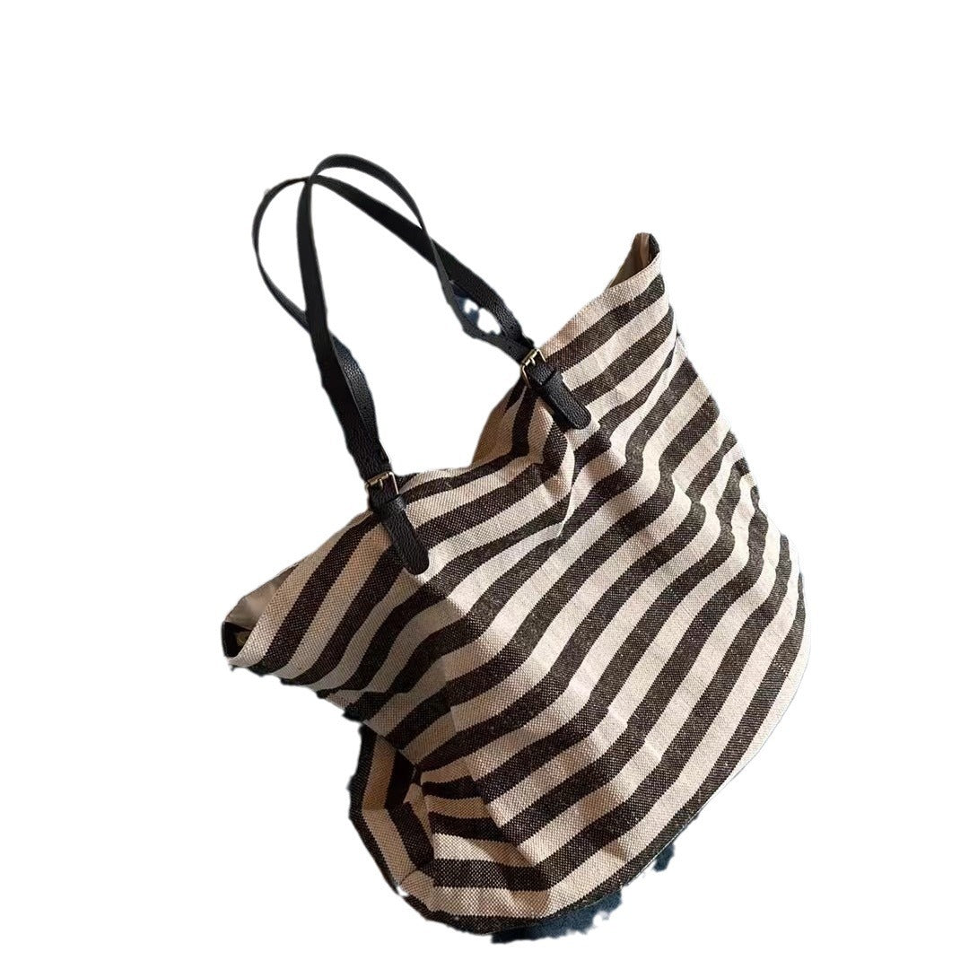 网红同款包包女士2024新款大容量条纹棉麻牛皮单肩托特包手提大包