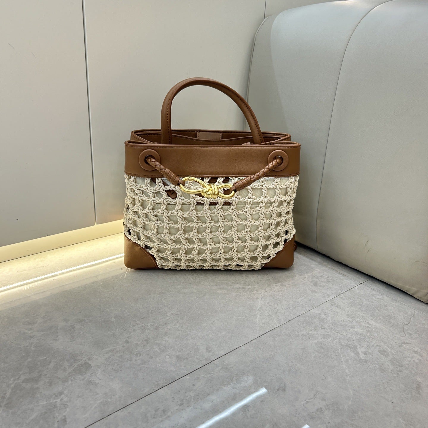 速卖通2025爆款拉菲草金属蝴蝶结托特包简约撞色手拎斜挎托特包包