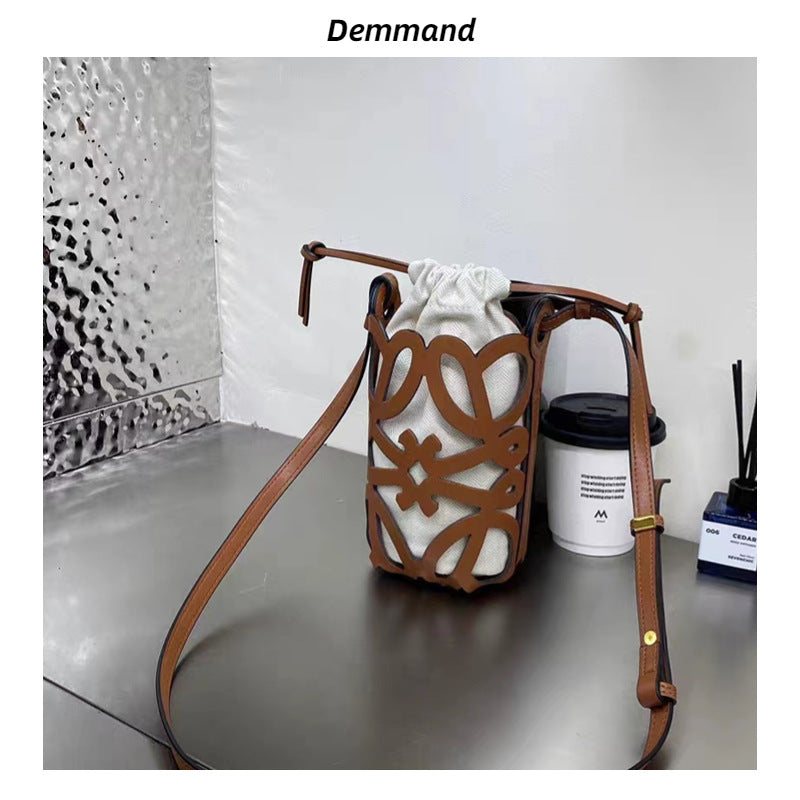 欧货品质女包2023新款水桶包复古文艺牛皮镂空个性单肩斜挎包包