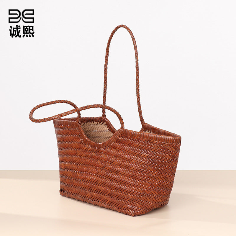 春夏手提女包牛皮单肩腋下托特包真皮小众编织包大容量菜篮子母包