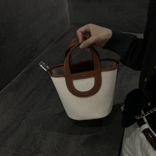 高级感猪鼻子包包大容量女包2024新款真皮小众水桶包斜挎菜篮子包