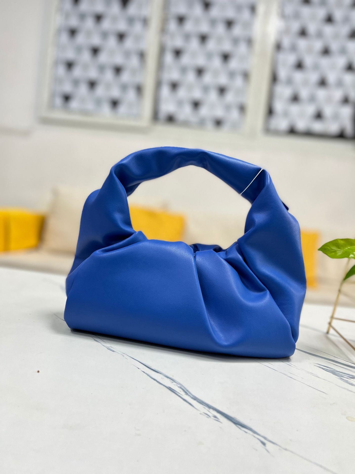 包包女2022新款女包牛角包pouch云朵包饺子包手提单肩包真皮女包