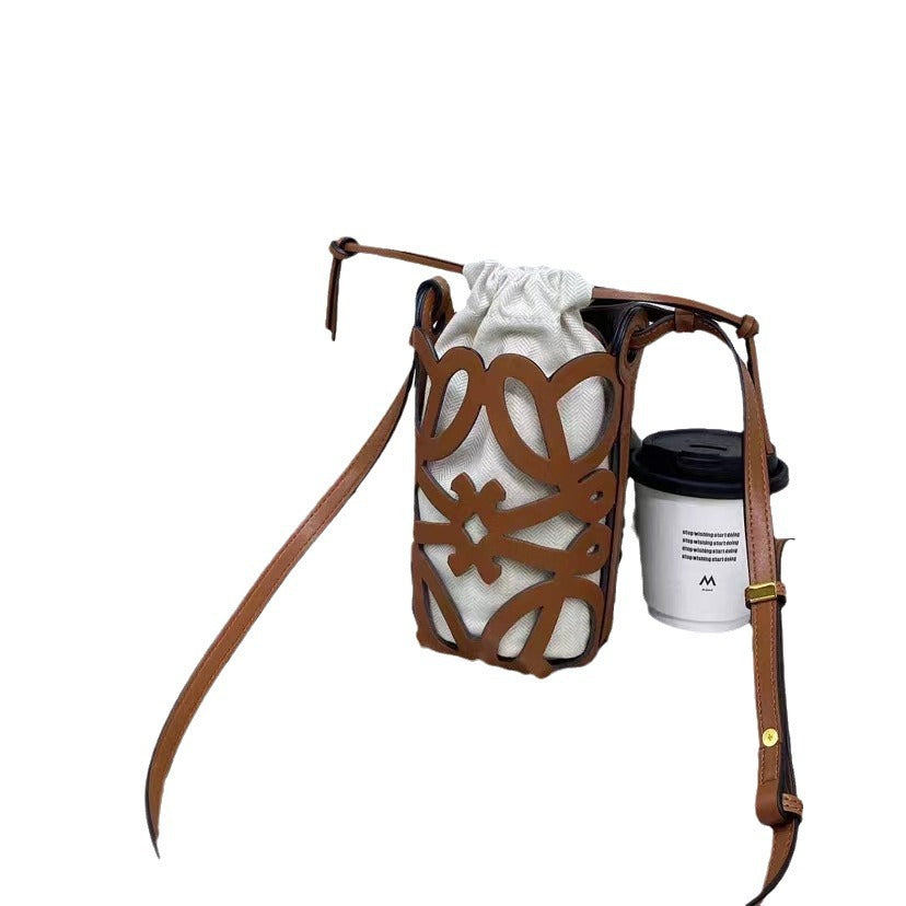 欧货品质女包2023新款水桶包复古文艺牛皮镂空个性单肩斜挎包包