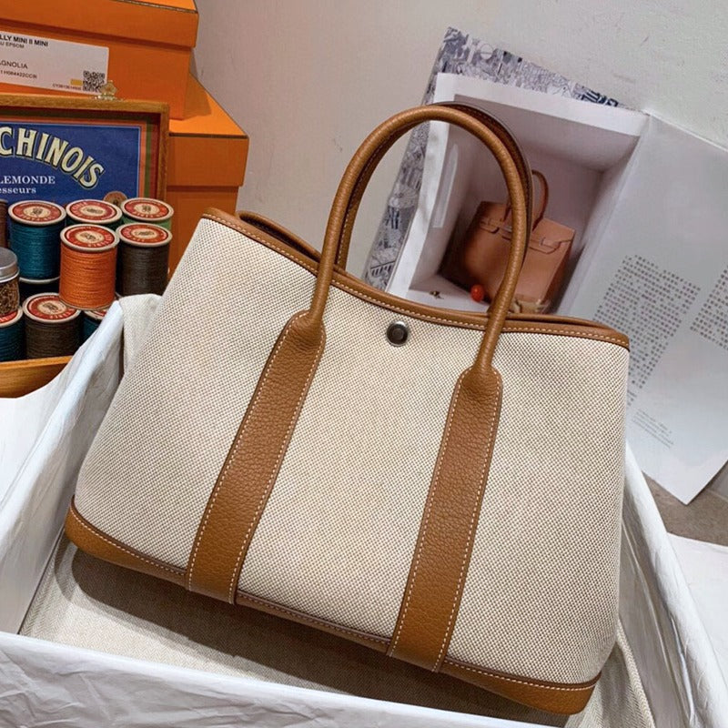 文艺范 花园帆布配TOGO头层牛皮女包手提包大容量撞色单肩托特包