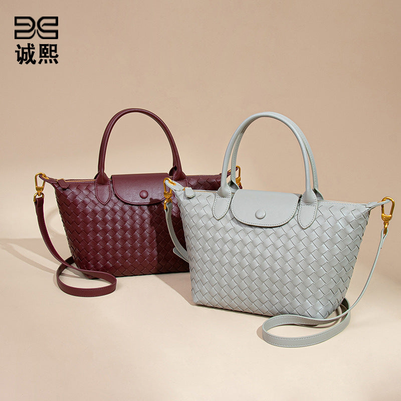 气质高级感手提女包时尚手工编织包纯色龙襄饺子包质感单肩斜跨包