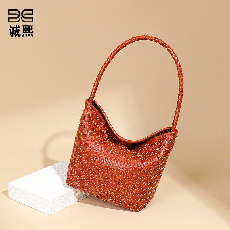 夏季海边度假慵懒风单肩女包休闲百搭手提水桶包小众菜篮子腋下包