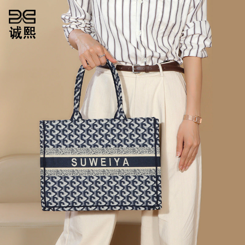 包包2025新款潮大容量托特包单肩手提购物袋时尚针织提花刺绣女包