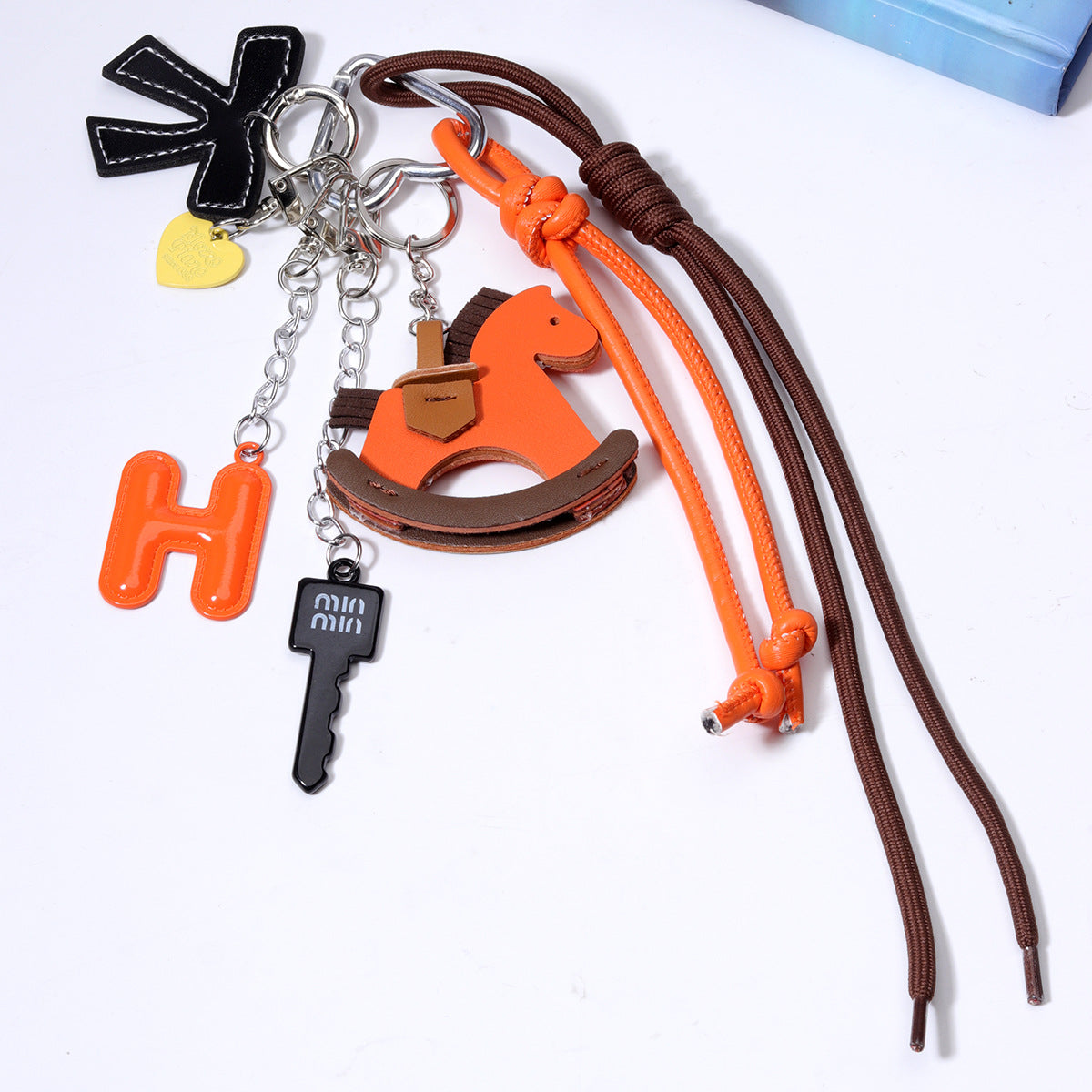 跨境货源义乌现货diy包包串珠挂件批发miu系包挂绳子手机链配饰