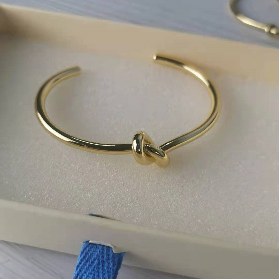 赛家新款耳圈手镯手环女光身镀金简约高级感气质耳饰打结圆圈耳环