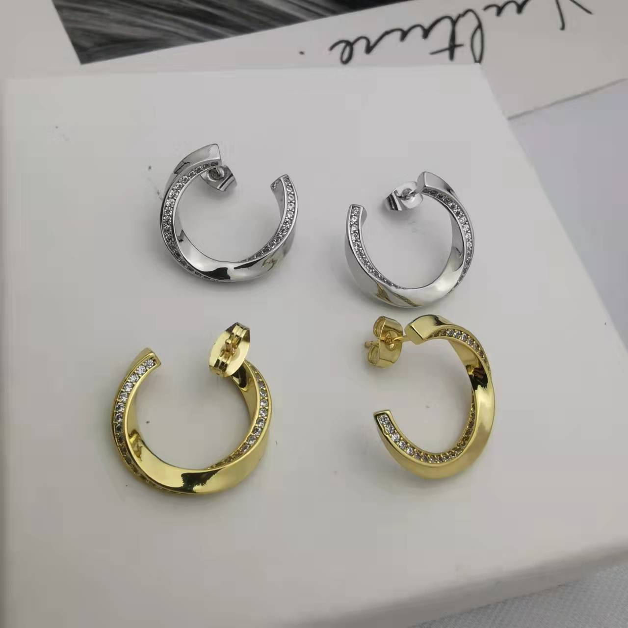 赛家21新款扭曲耳钉女镶钻高级感气质几何形celi镀金环形曲面耳环