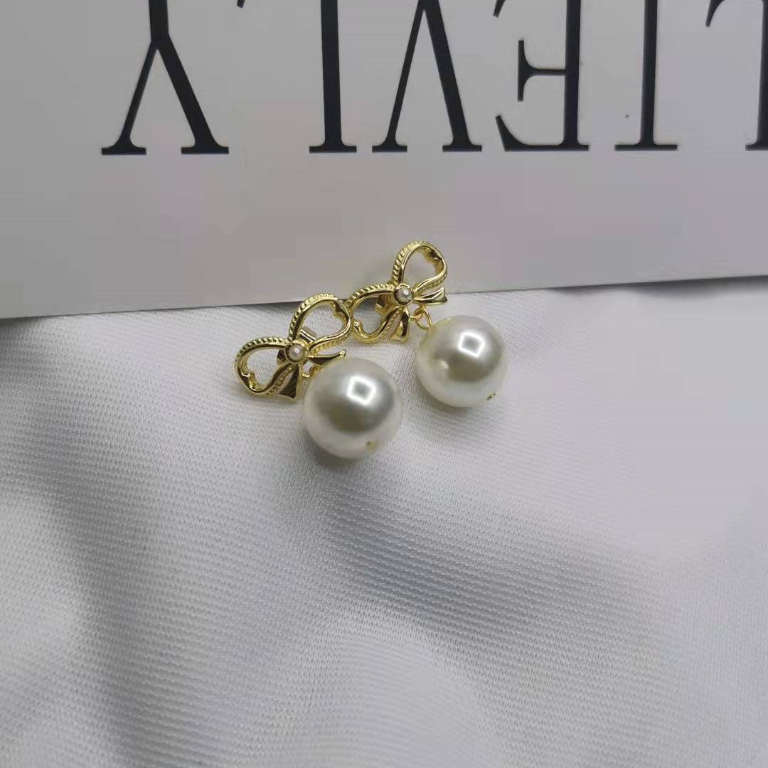 赛家21新款蝴蝶结耳钉珍珠耳坠女高级感甜美INS风几何形镀金耳环