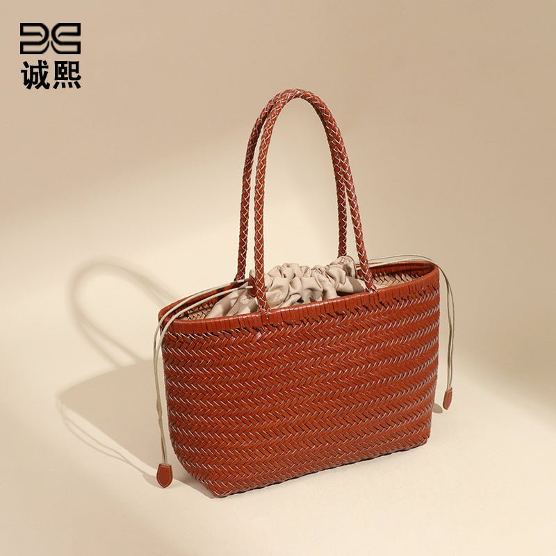 牛皮复古菜篮子手提托特女包个性手工编织包休闲度假风单肩腋下包