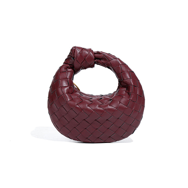 外贸新品时尚手拎饺子包打结手工编织女包百搭mini质感纯色牛角包