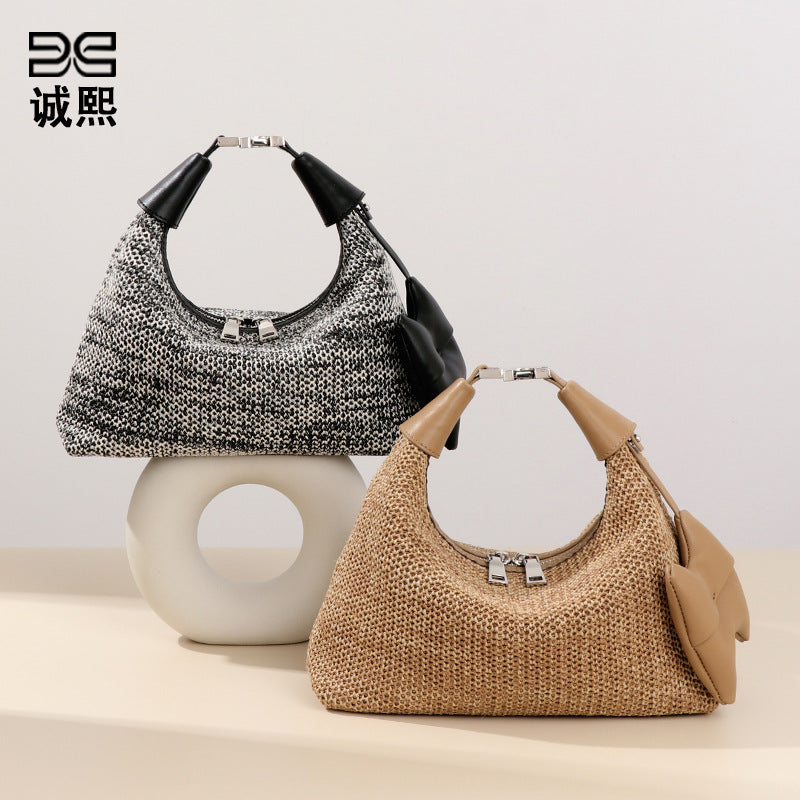 海边夏日新款拉菲草手拎饭盒包休闲百搭单肩腋下包时尚草编饺子包