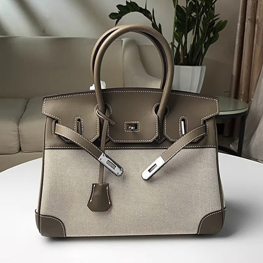 高品质时尚简约铂金包帆布拼接swift牛皮女包休闲桶包手提单肩包