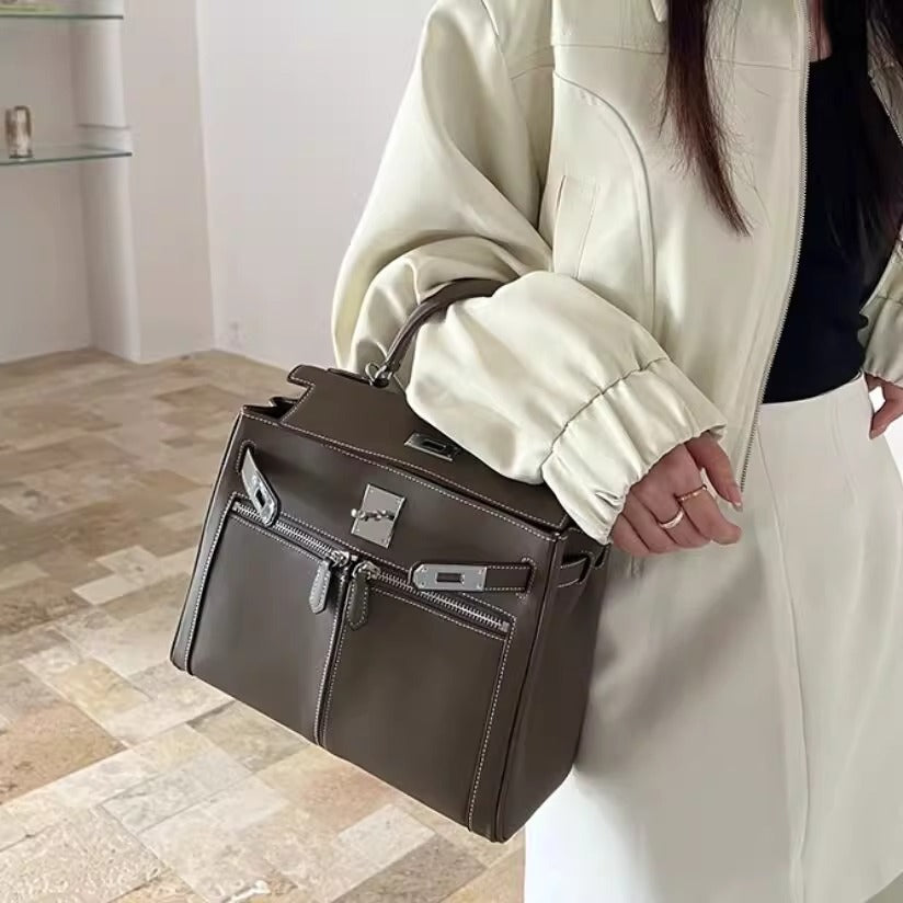 百搭通勤单肩斜挎包宽肩带凯莉包手提包真皮大容量单肩斜挎包女