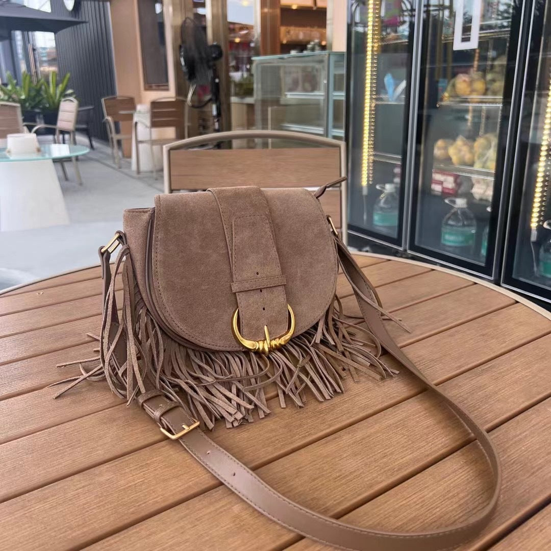 磨砂牛皮猪鼻子流苏包包时尚百搭秋冬麂皮绒女包单肩斜挎马鞍包