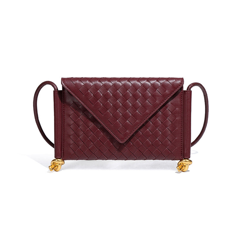 夏季洋气百搭编织女包简约休闲单肩斜跨邮差包新款潮流手拿信封包