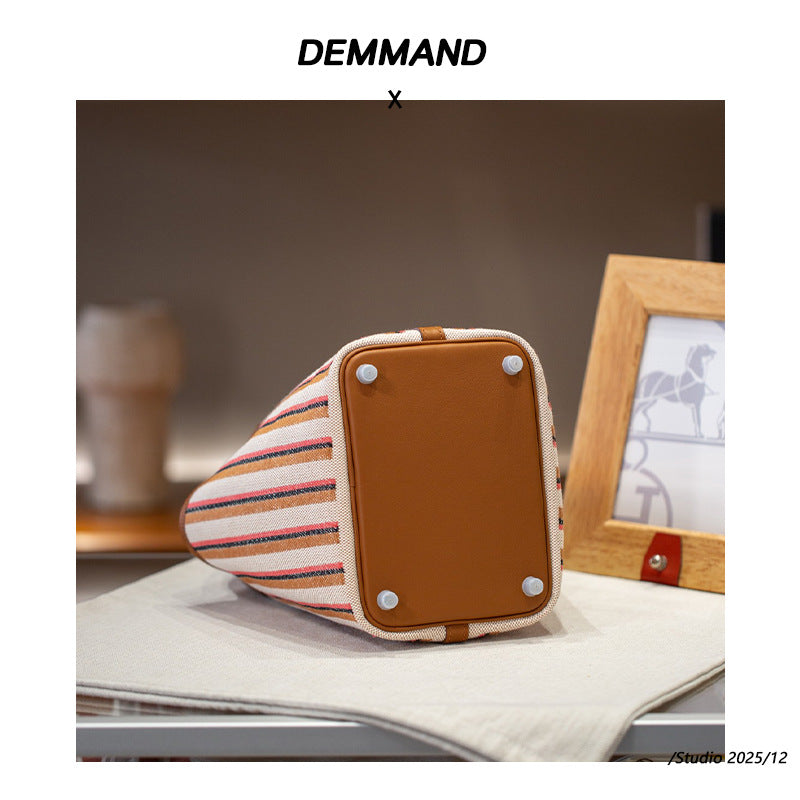 2025夏新款帆布配皮菜篮子大容量手提包通勤百搭真皮女包工厂批发