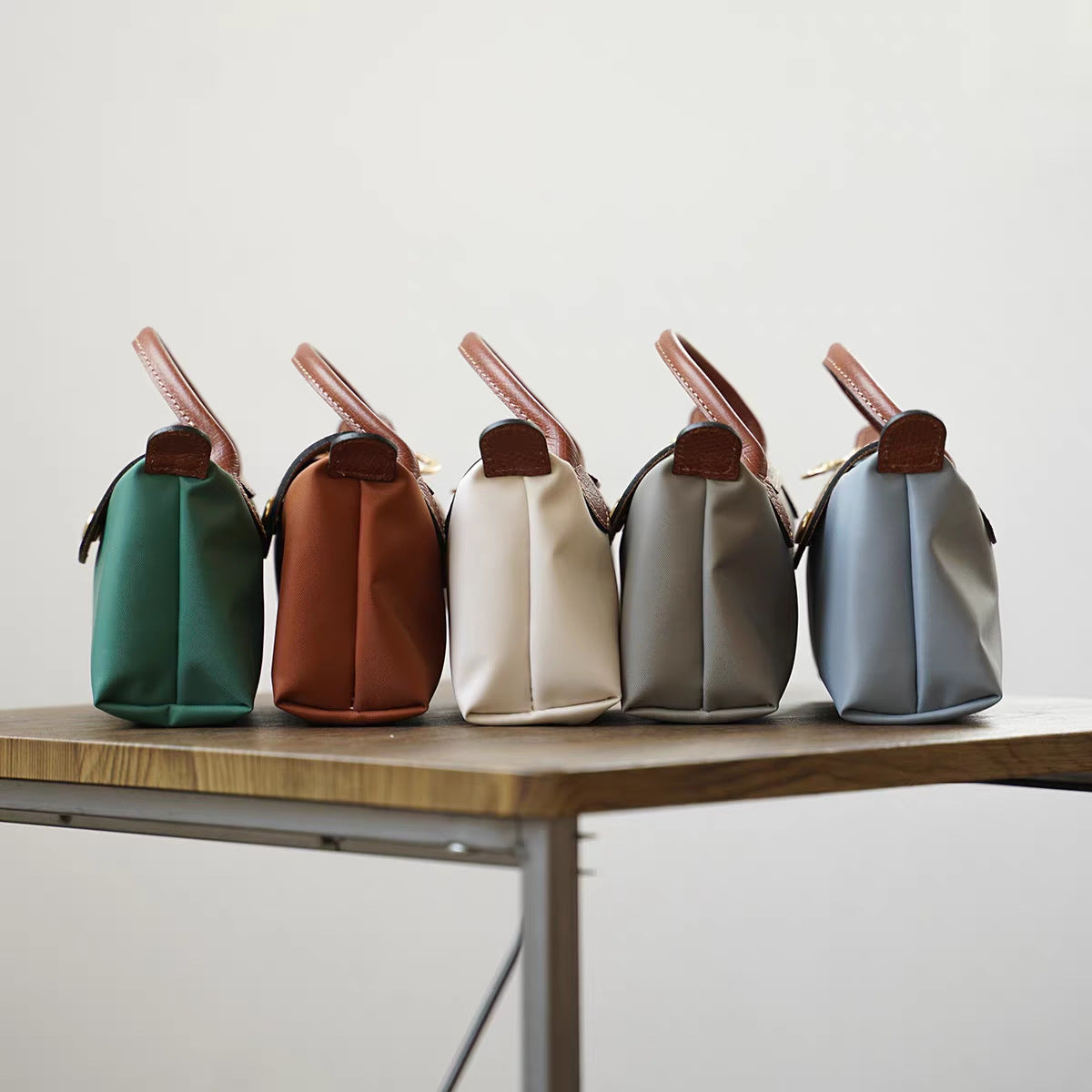 法国夏季新款mini尼龙饺子包单肩斜挎包迷你化妆包百搭手提手机包