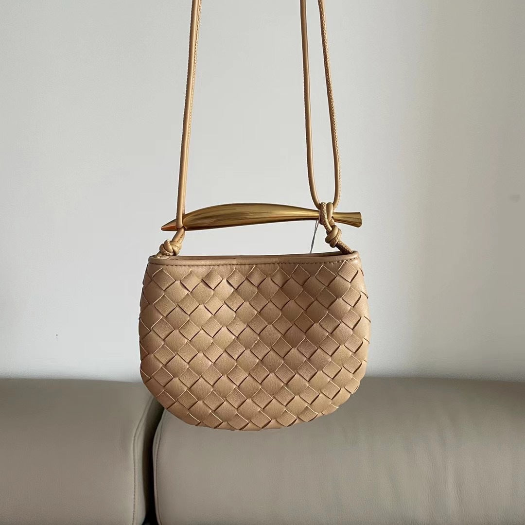 小众设计师编织新款金属手拎高级饺子包真皮牛皮休闲手提女士包包