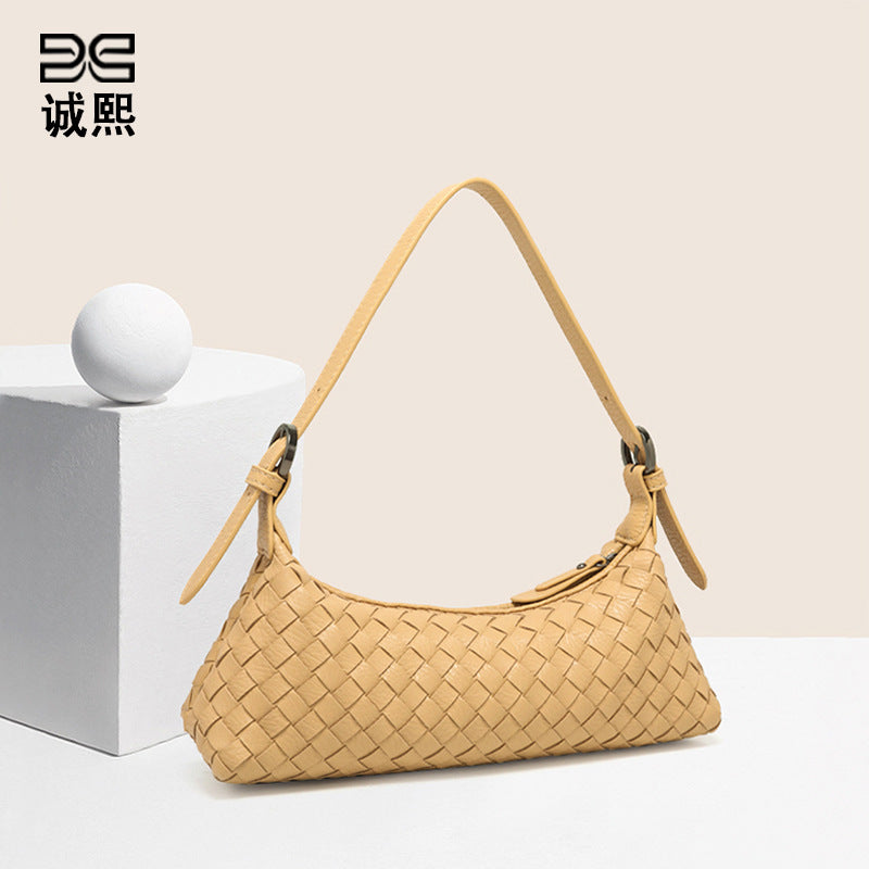 简约百搭手工编织包纯色单肩腋下包时尚潮流法棍包女士斜跨饺子包