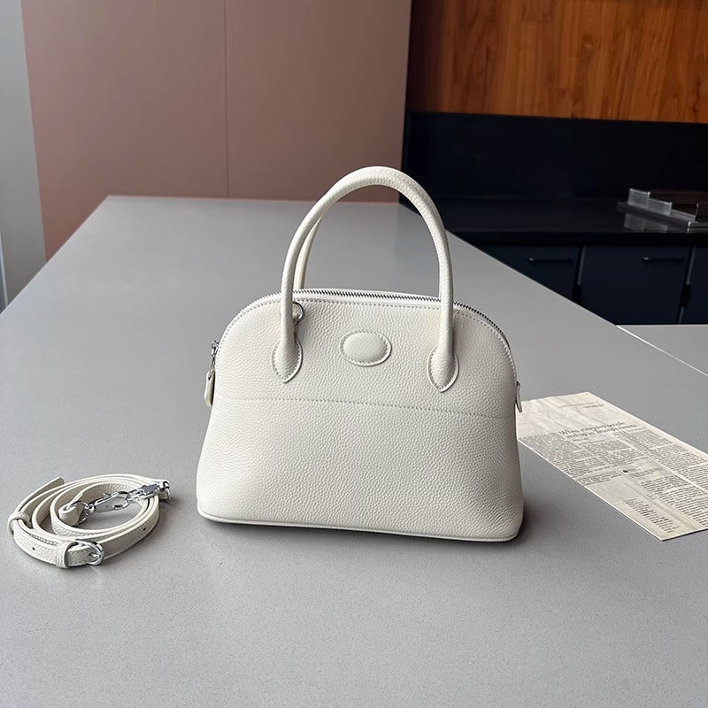 新款荔枝纹真皮贝壳包头层牛皮保龄球手提包拉链大容量通勤女包