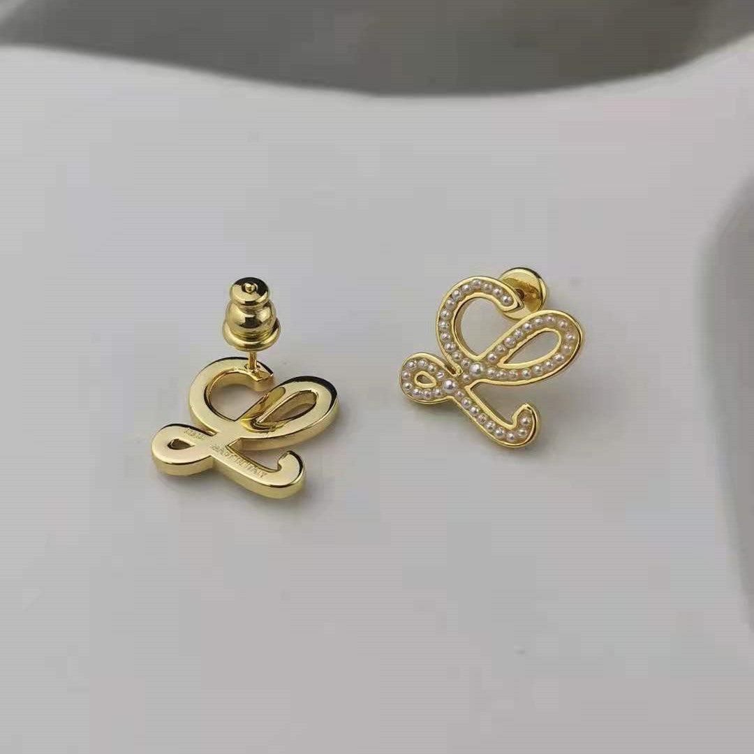 罗家新款几何抽象珍珠耳钉高级感时尚气质厂家批发高版小米珠耳环